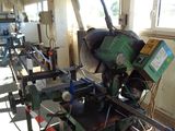 a machine that is working on a piece of wood