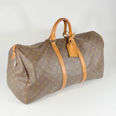 Sac Keepall Louis Vuitton en toile Monogram et cuir