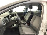 the interior of a car with the front seats down and the center console down