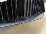 a close up of a grille on a car