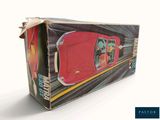 a cardboard box with a toy car inside of it
