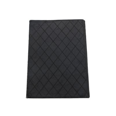 a close up of a black notebook on a white background