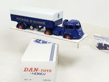 a toy truck that is sitting on top of a box