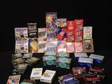 a lot of different types of cigarettes on a black table