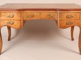 an image of a wooden desk with drawers on top of it