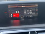 the dashboard of a car with a digital display on it