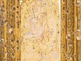 a painting of a woman holding a child in a gold frame