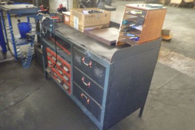 an image of a workbench in a garage with tools