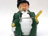 a figurine of a man with a baseball bat in his hand