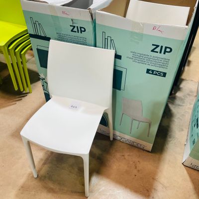 a lot of boxes and chairs that are sitting on the floor