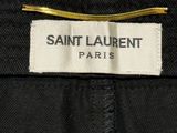 saint laurent label on a black suit