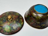 two vases that are sitting on a table
