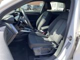 the interior of a car with the door open and the seats down