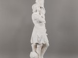 an image of a statue of a woman holding a child
