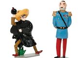 two figurines of a man and a woman dressed in uniforms