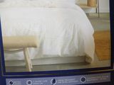 a picture of a tv that is on a bed