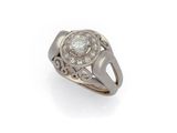 a diamond and platinum - plated ring, by van cleef