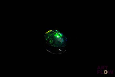 a green fire oplite in the dark