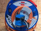 a blue and orange hose attached to a blue and white hose