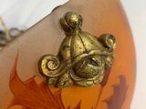 an image of a glass bracelet with a bear on it