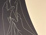 a black and white drawing of a woman with a veil