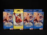 trois paquets de cartes de jeu de cartes « One Piece » sur fond noir