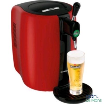 an image of a beer dispenser with a glass of beer