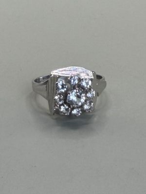 an image of a diamond ring on a table