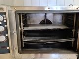 an image of a toaster oven with the door open