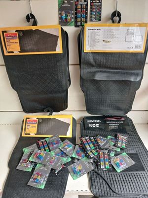 several pieces of luggage sitting on top of a counter next to other items