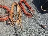 a lot of rope and other items on the ground