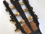 a guitar that is sitting on top of a table