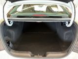 a trunk of a car with the back door open