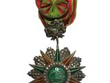 l'image d'une médaille surmontée d'une étoile