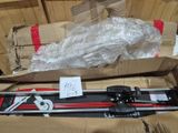 a box of skis and a pair of skis in it