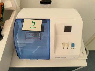 a machine that has a sign on the side of it