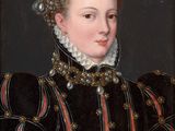 portrait of a woman in a black and red dress with pearls on her head