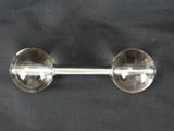 a glass door handle that is on a black cloth