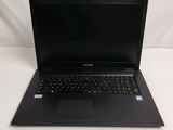 a black laptop computer sitting on a white surface