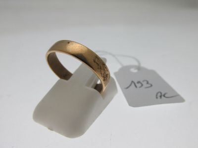 an image of a gold ring with a price tag on it