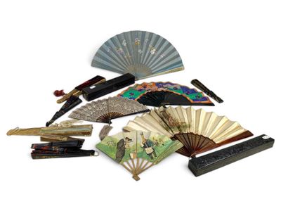 many different types of fan and other items on the table