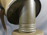 a gas mask that is on top of a table