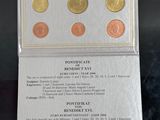a close up of a card with coins on it on a table