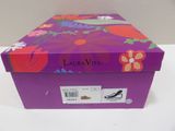 the box is purple and has a floral design on it