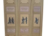 trois livres sur lesquels figurent des silhouettes de personnes sur fond blanc