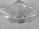 a glass bowl that is sitting on a table