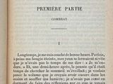 an open book with a black and white image of the title of a novel