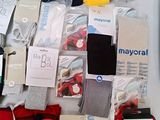 several pairs of men ' s socks are laid out on a table