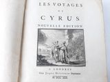an old book with a picture of a man and a woman on it