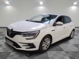 a white car parked in a room with a checkered floor